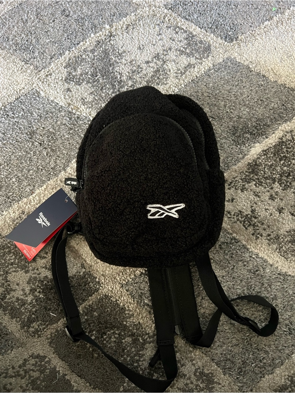Reebok Berry Crossbody Black Sherpa Mini Backpack with White Logo